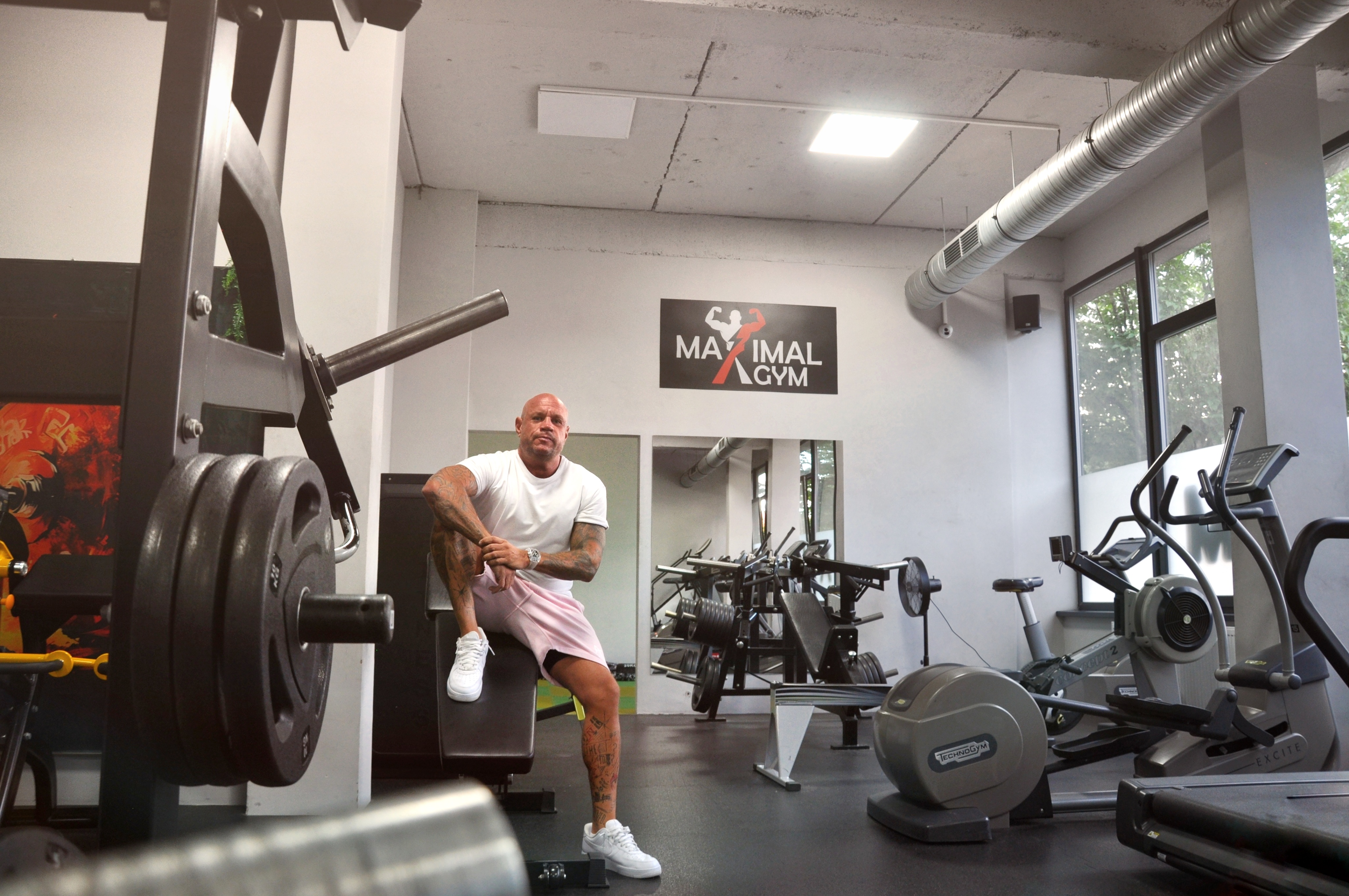 Kuba při tréninku na kladce v Maximal Gym